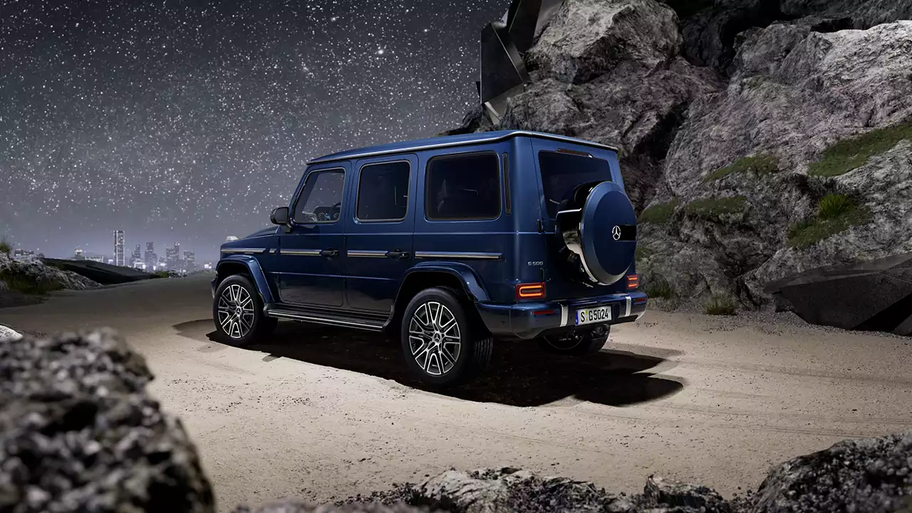 Mercedes G 500 sous une nuit étoilée